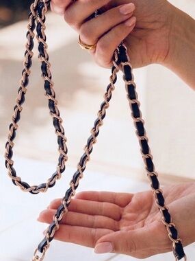 Elegant Gold and Black bag chain.